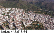Aerial view of Ojen, white village over a hillside near Marbella, Spain in the spring. Стоковое видео, видеограф Яков Филимонов / Фотобанк Лори
