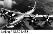 A large silver airplane is flying through the sky. Стоковое AI-изображение, AI-художник Ярославский Максим / Фотобанк Лори