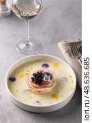 A traditional dish in Peru, ceviche, elegant appetizer of fresh fish in lime sauce leche de tigre, black caviar. Стоковое фото, фотограф Наталья Угрюмова / Фотобанк Лори