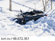 An old motorcycle with a sidecar sank into a snowdrift in winter. Стоковое фото, фотограф Сергей Фролов / Фотобанк Лори