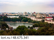 Minsk cityscape with Svislach river and General Staff of the Republic of Belarus in the distance. Aerial view on the center of Minsk, Belarus. City park surrounded by residential buildings. Стоковое фото, фотограф Константин Григорьев / Фотобанк Лори