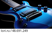shiny blue electric guitar ai generated. Стоковое AI-изображение, AI-художник Vectorwin / Фотобанк Лори