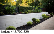 interlocking landscaping retaining wall ai generated. Стоковое AI-изображение, AI-художник Vectorwin / Фотобанк Лори