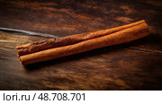 up cinamon stick on table ai generated. Стоковое AI-изображение, AI-художник Vectorwin / Фотобанк Лори