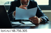 Бизнесмен изучает и подписывает контракт. The businessman studies and signs the contract. Стоковое AI-изображение, AI-художник Смирнова Светлана / Фотобанк Лори