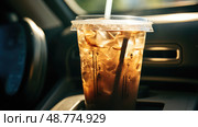commute iced coffee in car ai generated. Стоковое AI-изображение, AI-художник Vectorwin / Фотобанк Лори