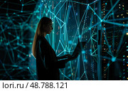 Hightech data center with woman using laptop and digital glowing blue lines. Стоковое AI-изображение, AI-художник Anastasy Yarmolovich / Фотобанк Лори