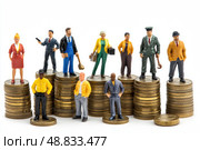 Miniature workers and businesspeople standing on stacks of coins symbolizing income inequality, labor market, salary differences, financial hierarchy, and economic disparity. Copy space. Banner. Стоковое AI-изображение, AI-художник Евгений Демидюк / Фотобанк Лори