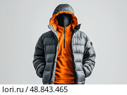 Stylish Gray and Orange Puffer Jacket Suitable for Cold Weather Activities and Casual Outings. Стоковое AI-изображение, AI-художник Юлия Гапеенко / Фотобанк Лори