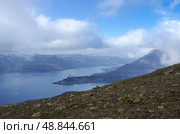 Панорама Рейдарфьордура (Reydarfjordur ), крупнейшего фьорда. Восточная Исландия. Вид с горы Наттмаланьюкур (Nattmalahnjukur ) Стоковое фото, фотограф Дымов Игорь / Фотобанк Лори