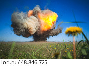 Контролируемый взрыв снаряда во время разминирования поля. Стоковое фото, фотограф Александр Река / ТАСС / Фотобанк Лори