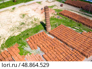 Pallets with bricks in a warehouse of a brick factory. View from above. Стоковое фото, фотограф Евгений Ткачёв / Фотобанк Лори