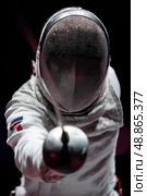 A man in a white uniform is fencing with a sword. Стоковое AI-изображение, AI-художник Ярославский Максим / Фотобанк Лори