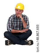 A moody tradesman. Стоковое фото, агентство Ingram Publishing / Фотобанк Лори