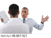 Man yelling at his assistant. Стоковое фото, агентство Ingram Publishing / Фотобанк Лори