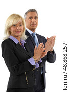 Business professionals clapping their hands. Стоковое фото, агентство Ingram Publishing / Фотобанк Лори