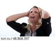 Horrified blond businesswoman. Стоковое фото, агентство Ingram Publishing / Фотобанк Лори