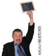 Man with a small chalkboard. Стоковое фото, агентство Ingram Publishing / Фотобанк Лори