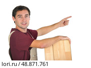craftsman pointing at something. Стоковое фото, агентство Ingram Publishing / Фотобанк Лори