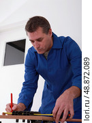 Blue collar worker. Стоковое фото, агентство Ingram Publishing / Фотобанк Лори