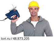 Smiling handyman. Стоковое фото, агентство Ingram Publishing / Фотобанк Лори