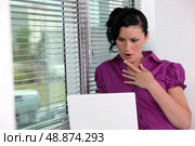 Amazed businesswoman in her office. Стоковое фото, агентство Ingram Publishing / Фотобанк Лори