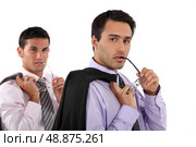 Man copying his colleague. Стоковое фото, агентство Ingram Publishing / Фотобанк Лори