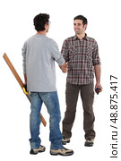 Two carpenters shaking hands. Стоковое фото, агентство Ingram Publishing / Фотобанк Лори