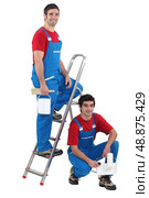 Two men painters on white background. Стоковое фото, агентство Ingram Publishing / Фотобанк Лори