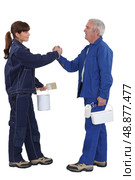 Painters forming a partnership. Стоковое фото, агентство Ingram Publishing / Фотобанк Лори