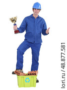 Builder awarded prize for recycling. Стоковое фото, агентство Ingram Publishing / Фотобанк Лори