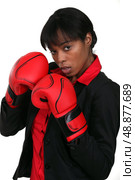 businesswoman with boxing gloves. Стоковое фото, агентство Ingram Publishing / Фотобанк Лори