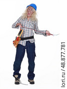 Shocked female electrician. Стоковое фото, агентство Ingram Publishing / Фотобанк Лори
