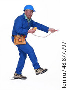electrician having an accident. Стоковое фото, агентство Ingram Publishing / Фотобанк Лори