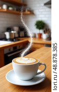 Coffee cup with intricate latte art on wooden countertop in cozy kitchen. Steam rising above creates artistic swirl pattern, soft lighting enhances warmth. Background kitchen elements blurred. Стоковое AI-изображение, AI-художник Olga Dmitrieva / Фотобанк Лори