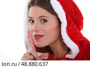 Woman with her finger to her lips. Стоковое фото, агентство Ingram Publishing / Фотобанк Лори