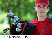 Golfer with club on his shoulder. Стоковое фото, агентство Ingram Publishing / Фотобанк Лори