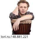 Young man with a djembe drum. Стоковое фото, агентство Ingram Publishing / Фотобанк Лори