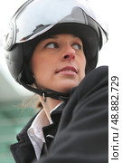 Businesswoman on a scooter. Стоковое фото, агентство Ingram Publishing / Фотобанк Лори