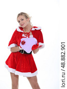 Woman dressed as Mrs Claus. Стоковое фото, агентство Ingram Publishing / Фотобанк Лори