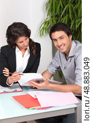 Job applicant in professional interview. Стоковое фото, агентство Ingram Publishing / Фотобанк Лори