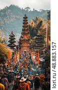 A vibrant scene of a Balinese temple festival, featuring a large crowd of worshippers gathered in front of a traditional temple. Стоковое AI-изображение, AI-художник Данила Большаков / Фотобанк Лори