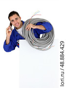 an artisan at phone. Стоковое фото, агентство Ingram Publishing / Фотобанк Лори