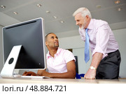 computer specialist and his boss. Стоковое фото, агентство Ingram Publishing / Фотобанк Лори