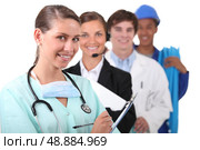 Four people from different work background. Стоковое фото, агентство Ingram Publishing / Фотобанк Лори