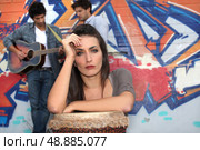 Three musician practicing outdoors. Стоковое фото, агентство Ingram Publishing / Фотобанк Лори
