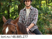 young riding horse. Стоковое фото, агентство Ingram Publishing / Фотобанк Лори