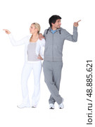 a blonde woman and a man in sports wear don’t agree. Стоковое фото, агентство Ingram Publishing / Фотобанк Лори