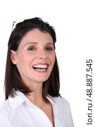 Young woman laughing. Стоковое фото, агентство Ingram Publishing / Фотобанк Лори