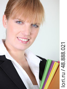 businesswoman holding folders. Стоковое фото, агентство Ingram Publishing / Фотобанк Лори